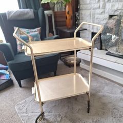 Vintage drinks trolly, with removable trays.