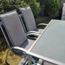 garden table with 6 chairs including cushions which are in perfect condition Image 4