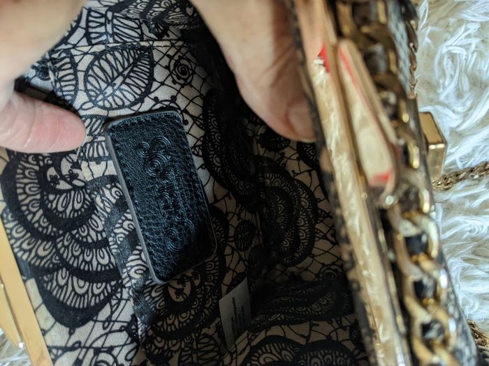 Handbag by Carlos Santana