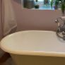 Claw legged roll top cast iron bath Image 2