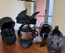 As New Egg2 travel system with Cybex car seat and isofix base swivel
