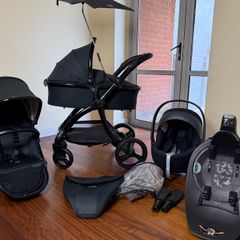 As New Egg2 travel system with Cybex car seat and isofix base swivel