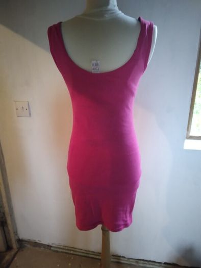 Stretch Dress,figure hugging.Size 12 Brand New.