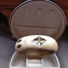 Costume bracelet,bone and brass bangle.