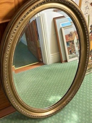 Oval Gilt-Framed Mirror