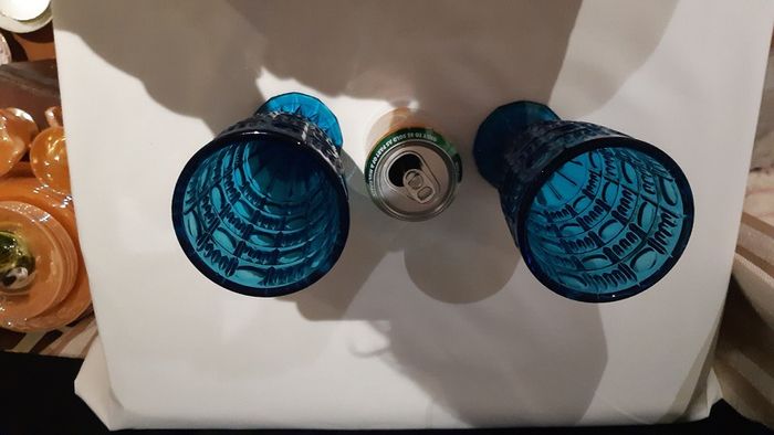 A pair of blue/deep turquoise glass vases