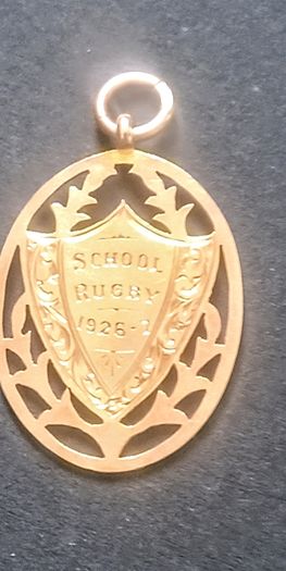 Antique 9ct rose gold school rugby shield pendant