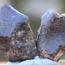 Meteorite 14.35 grams NWA 869 cut in 2 Image 3