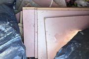 Black bin bag if off cuts if laminate floors