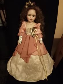 large. porcelain  doll   30  year  old   heigh  1ft  10  in   tall