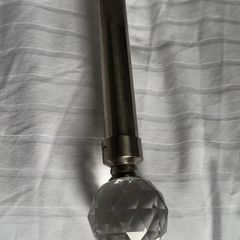 Curtain pole for eyelet curtains