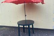 Garden table and parasol