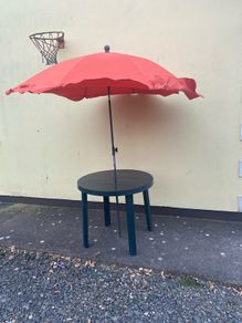 Garden table and parasol