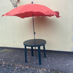 Garden table and parasol