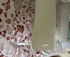 Foldable table for use on couch or bed etc height adjustable