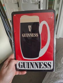 Guinness sign still in plastic