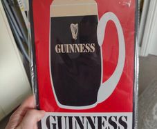 Guinness sign still in plastic
