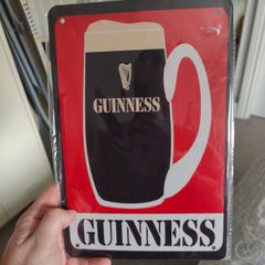 Guinness sign still in plastic