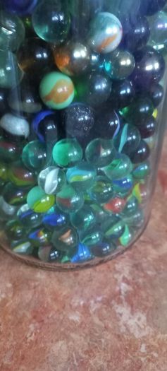 Antique collection of old marbles in large clip sealed jar it's full to the top loft find from very old house in France Beautiful