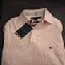 3 Tommy Hilfiger Tshirts (slightly) damaged, with tags never worn. Image 6