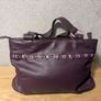 Designer Yoshi purple colour leather handbag Image 8