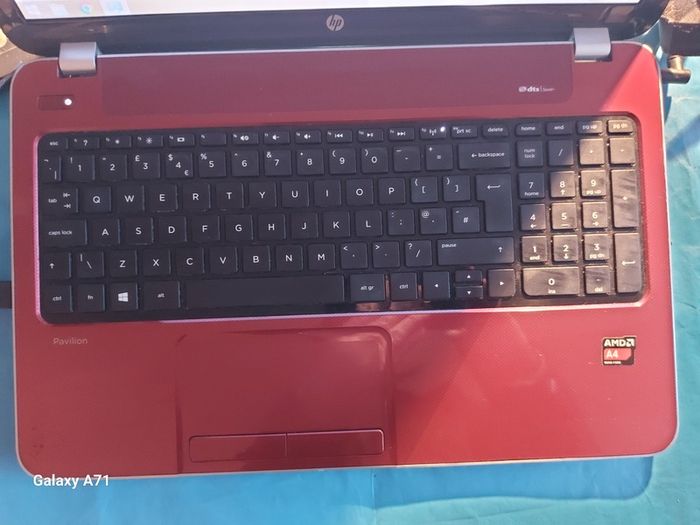 HP Pavillion, Red, 4GB Ram, 700GB HDD, Windows 8 Pro, AMD A4-5000 APU with Radeon HD Graphis 1.5GHz, Chrome and VLC for best movie ecperience