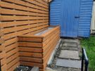 Custom timber garden fencing with integrated planters and bench Image 3
