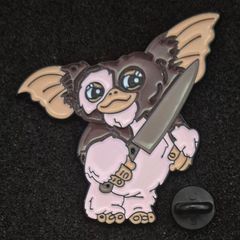 Gremlin , pin back badge.