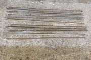 A set of old brass staire rods