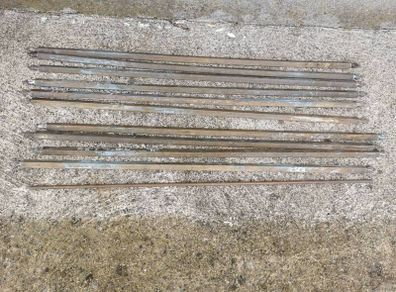 A set of old brass staire rods