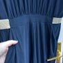 Navy jumpsuit with gold trim waist Image 2