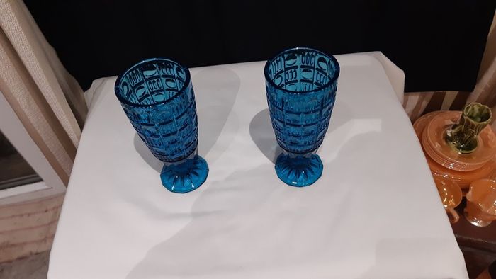 A pair of blue/deep turquoise glass vases