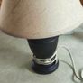 Small black carmic table lamp and shade in working order.38 cm, tall all togther. Image 2
