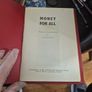 Money for all book with bank note Image 2