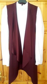 Sleeveless Satin Gilet.