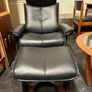 Pair of leather style armchairs with matching footstools Image 6