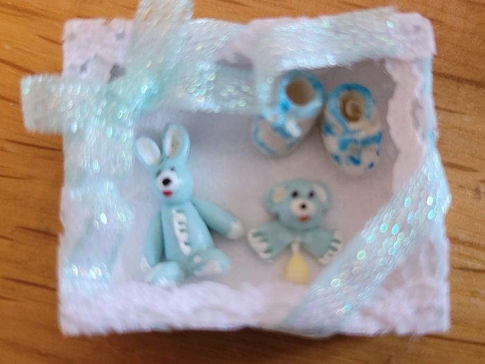 Baby items for dolls house nursery
