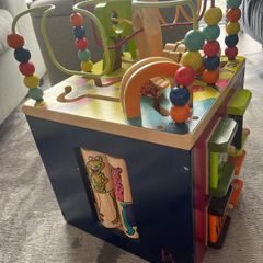 wooden activity cube