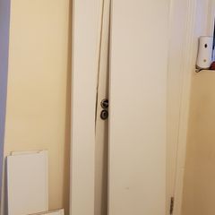 White furniture panels, wooden bits