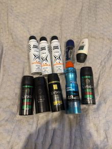 8 Cans of men's Deodorant