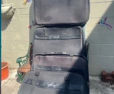 4 large suit cases 38 inch x 28in