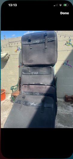 4 large suit cases 38 inch x 28in