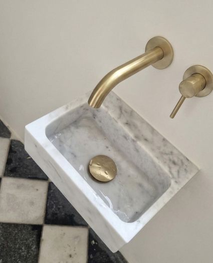 Cararra marble wall mounted sink