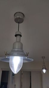 2 large silver pendant lights