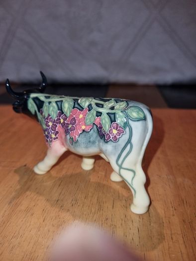 Porcelain colorful cow figurine