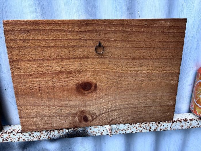 Matching pair of wooden wine plaques