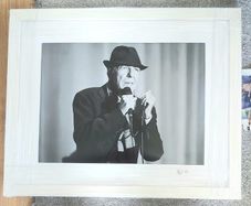 Photo of Leonard Cohen framed.