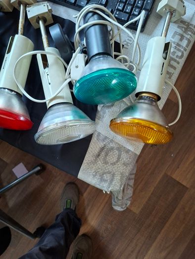 Large Theatrical or Display Lighting, including reflector lamps and colored PAR-style bulbs, with various lamp holders, plugs, and coiled electrical leads all working