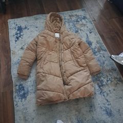 coat from next furry in the inside warm and size 10/11 25 euro for it
