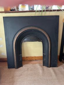 Cast iron fireplace insert